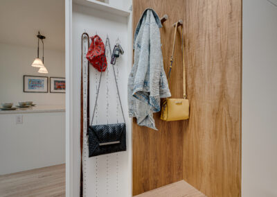 custom cabinets entrance mudroom white sliding panel