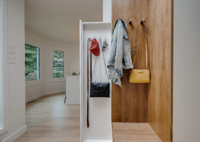 custom cabinets entrance mudroom white sliding panel