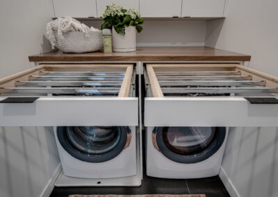 custom cabinets laundry room white pull out drying racks