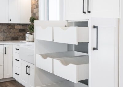 Floating shelves in whit oak along with a custom wine rack and custom doors