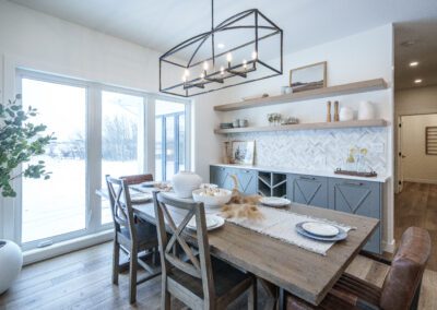 Simple white cabinets, Chelsey Grey Island with White Oak Accents at 23 Applewood Court